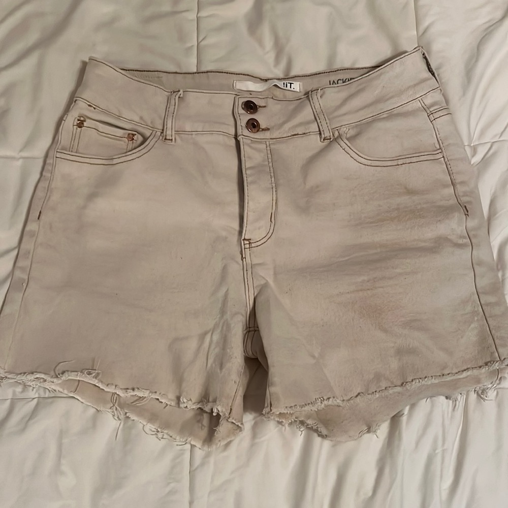 Khaki colored cutoff Jean shorts